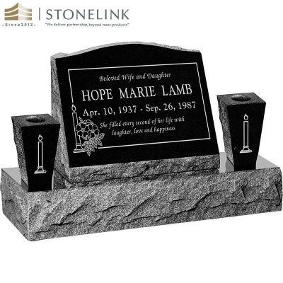 Granite slant headstone with vases